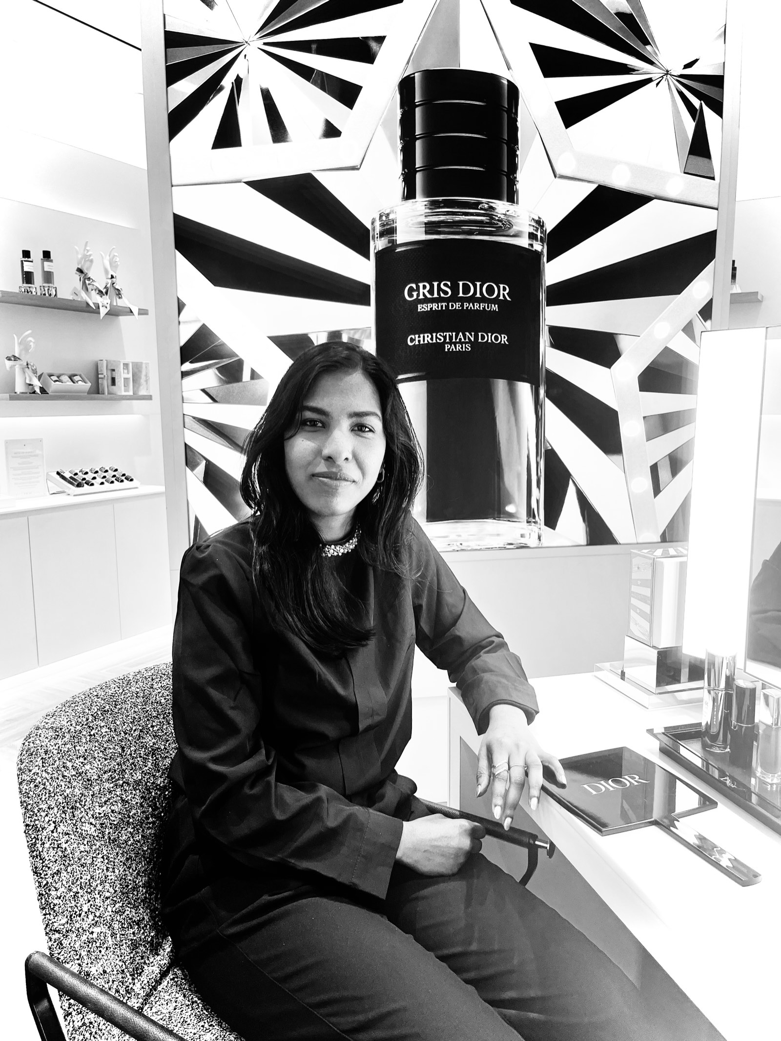 Live engraver personalising a Dior perfume bottle onsite at a brand activation event in Dublin, Ireland