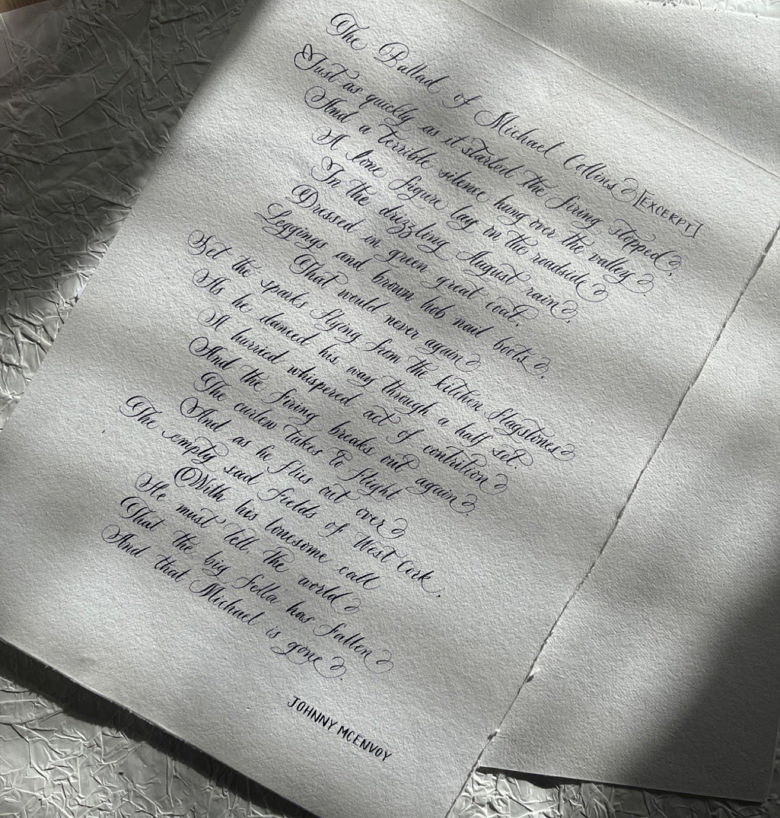 Handwritten song lyrics in calligraphy